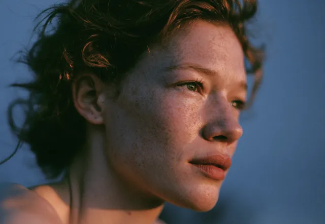 A clear-eyed, focused portrait in warm light
